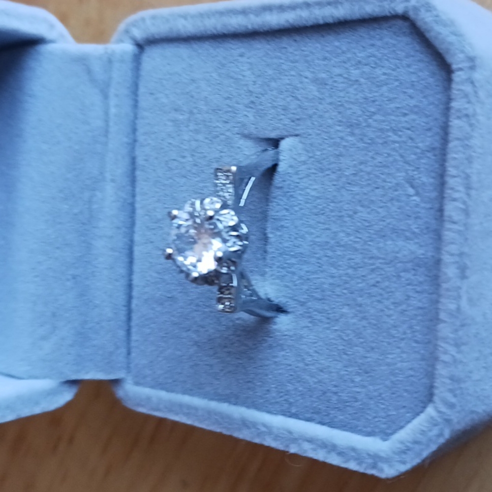 2 moissanite rings. 1 CT. & 1/2 CT selling separately. Better than diamonds.